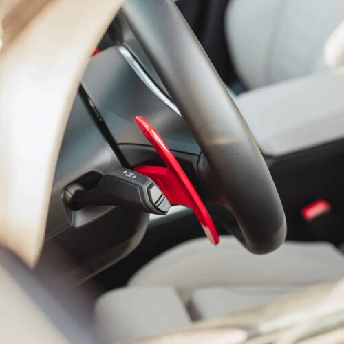 Rear close up view of the Aluminium gloss red paddle shifters installed in a BMW G21