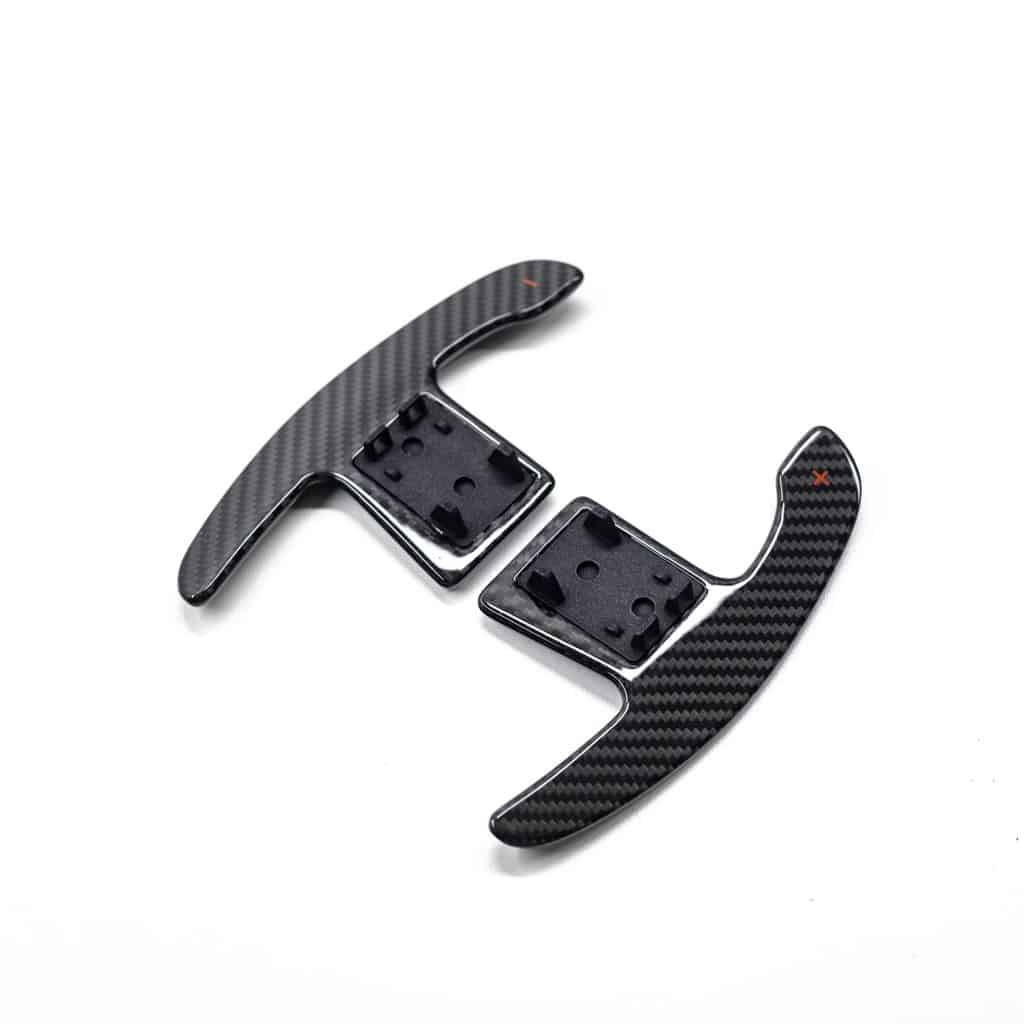 PaddleShifterz gloss carbon fiber paddle shifters with red +/- signs photographed on a white background