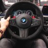 paddleshifterz carbon fiber paddle shifters in a BMW F90 M5 with alcantara steering wheel
