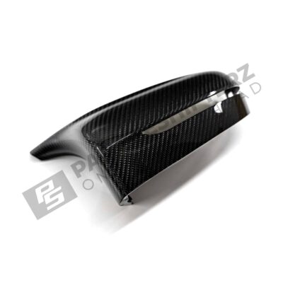 Side-front view of the OEM BMW M Performance Carbon fiber Mirror caps - 51162446821