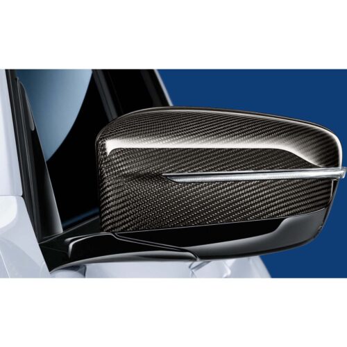 OEM BMW M Performance carbon fiber mirror caps 51162466669-51162466670 photographed on a BMW