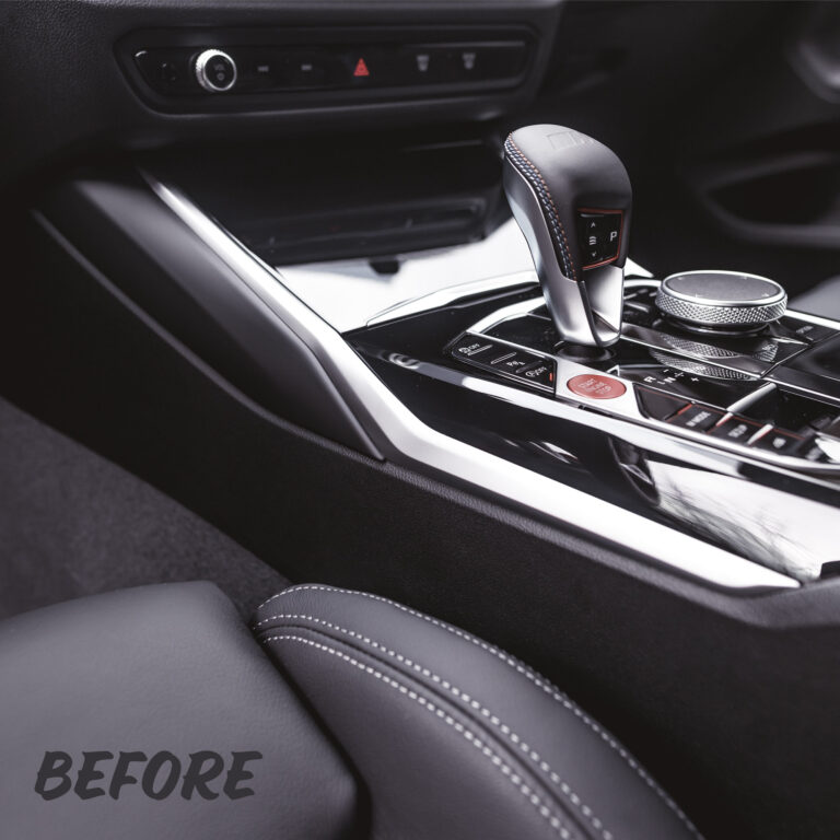 A photo of the standard knee pads before installing the OEM BMW M Performance alcantara knee pads for a BMW G87 M2