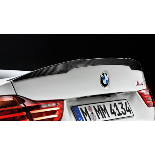OEM BMW Carbon fiber trunk spoiler fitted onto a white BMW F82 M4 51192350722