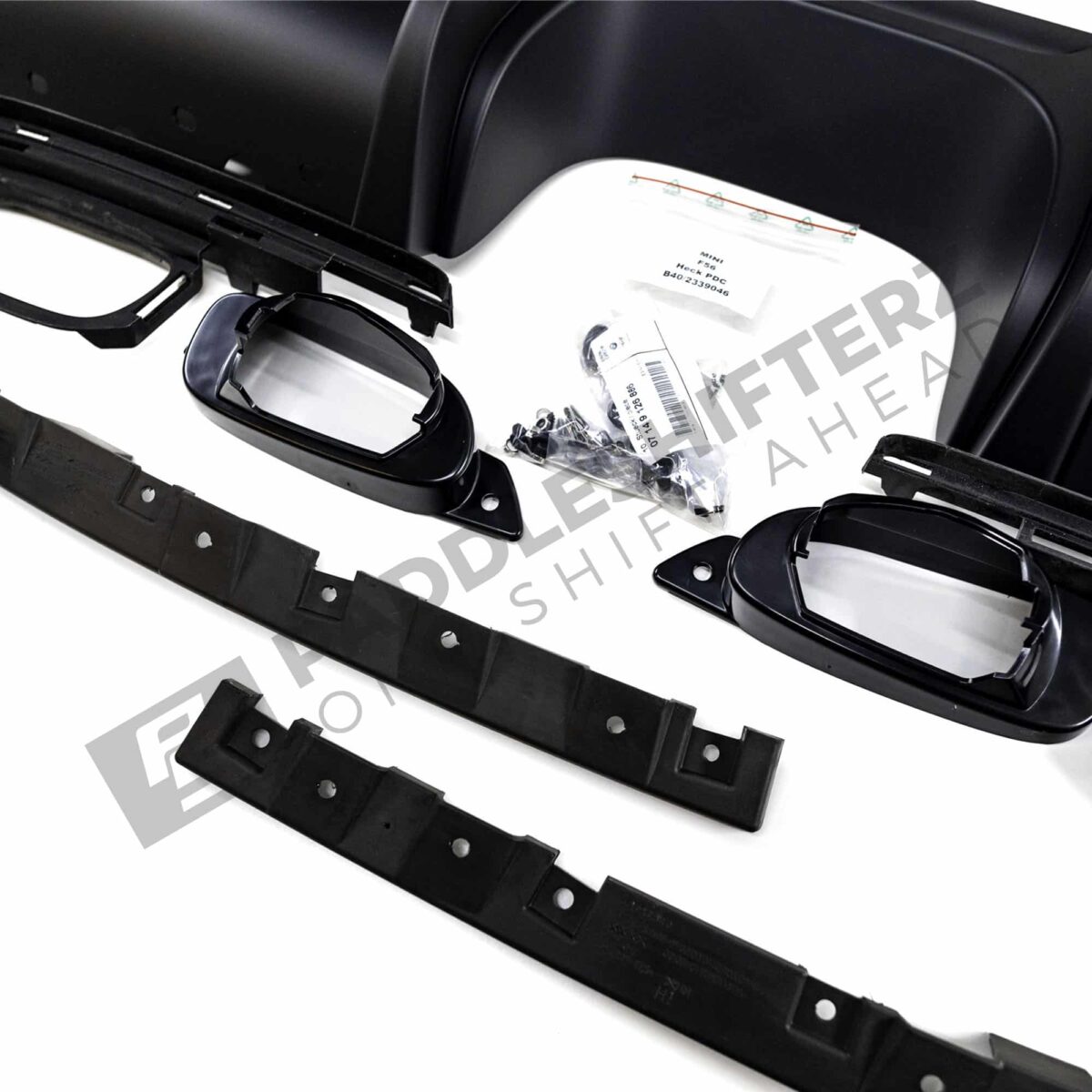 Close up of the accessories of MINI JCW rear diffuser kit - 51192339046, 51192339047