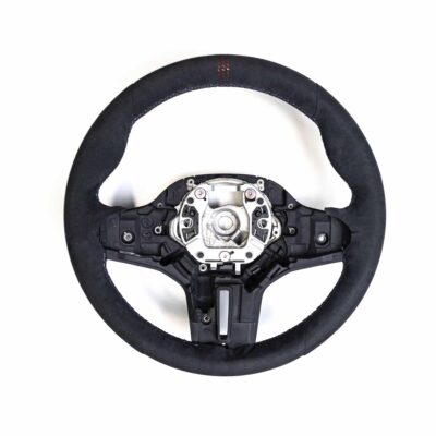 PaddleShifterz OEM BMW F90 M5 CS Alcantara steering wheel photographed from the top