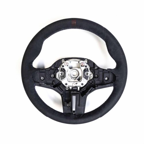 PaddleShifterz OEM BMW F90 M5 CS Alcantara steering wheel photographed from the top