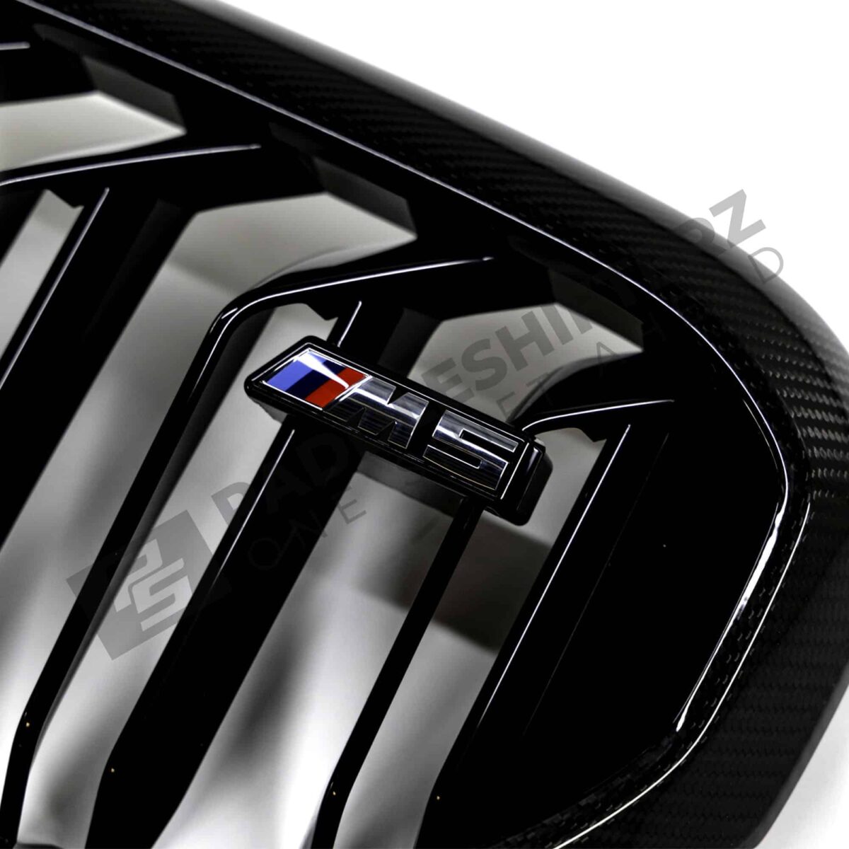 Close up view of the M5 logo on OEM BMW M Perf F90 LCI Carbon front grille – 51712469540