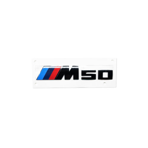 PaddleShifterz Original BMW M50 black badge for BMW G26 i4 models, photographed from a top view showing the M50 logo in black