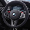 PaddleShifterz OEM BMW M5 CS Gloss black steering wheel trim - 32309503440 fitted into a BMW F90 M5 CS