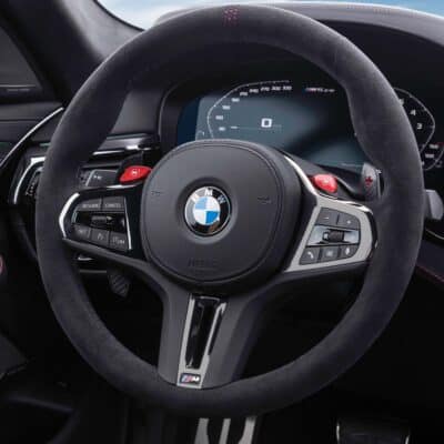 PaddleShifterz OEM BMW M5 CS Gloss black steering wheel trim - 32309503440 fitted into a BMW F90 M5 CS