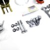 close up photo of the OEM BMW M Performance suspension lowering Kit - 31305A2D979 showing the extra bolts