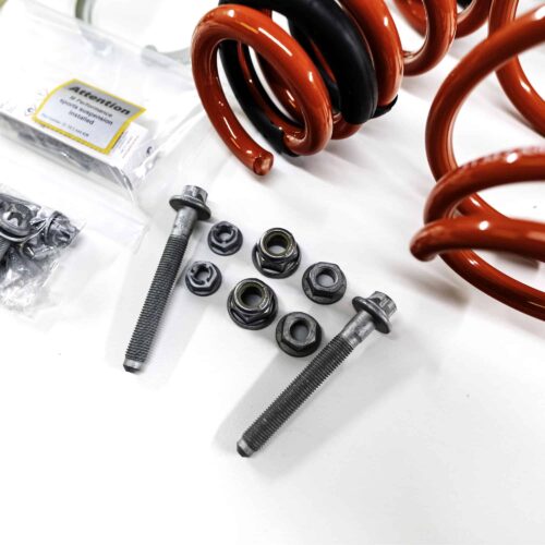 Close up shot of the bolts and nuts of the OEM BMW M Performance suspension lowering Kit - 31305A2D979