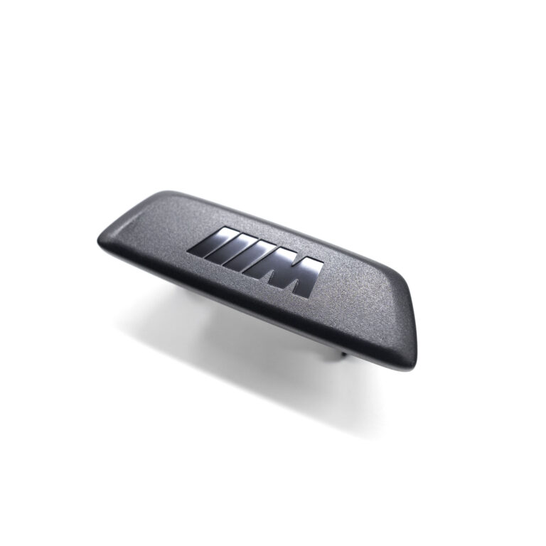 OEM BMW seat emblem in matte black finish - 52108098996