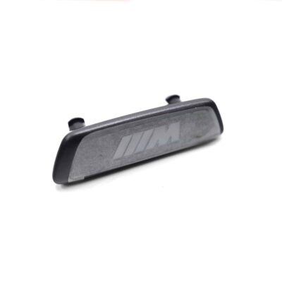 Alternative view of OEM BMW seat emblem in matte black finish - 52108098996