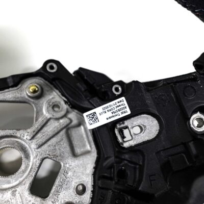 OEM BMW Alcantara steering wheel showing close up shot from right 32307874035