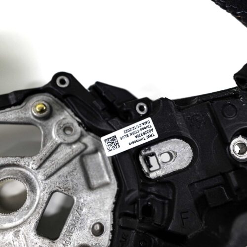 OEM BMW Alcantara steering wheel showing close up shot from right 32307874035