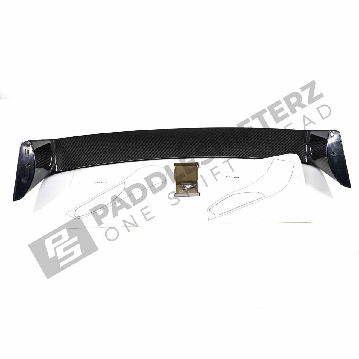 Bottom view of OEM BMW M Perf G87 gloss carbon fiber wing – 516625B33F50