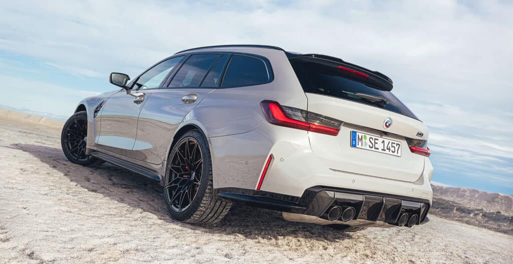 BMW G81 M3 Touring in chalk grey photographed from the rear