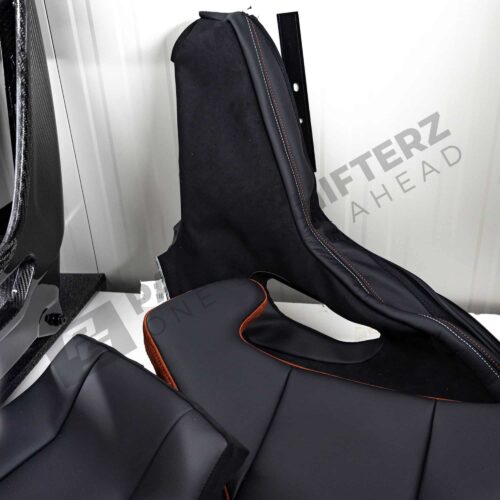 Close up shot of the side bolster of the OEM BMW G82 M4 CSL Complete Left Carbon fiber bucket seat