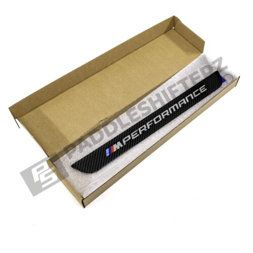 Side view in box OEM BMW M Performance Carbon door sill trim - 51475A6CBC3
