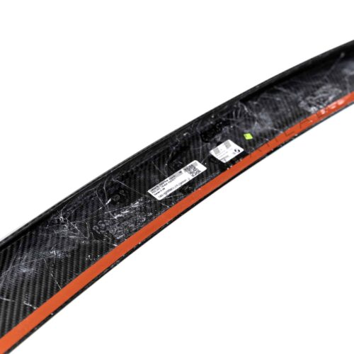 Close up showing the glue on OEM BMW M Performance Carbon fiber spoiler G60 - 51625A79E68