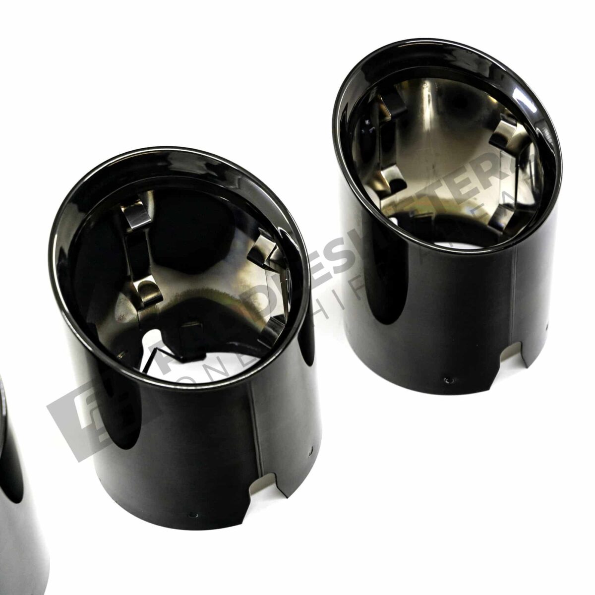 Close up view of OEM BMW G8X black chrome exhaust tip - 18308096126