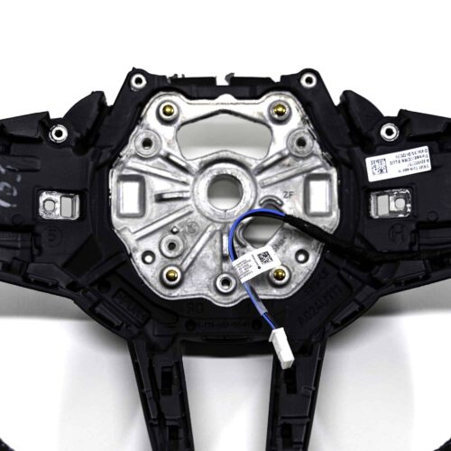 Close up shot of the OEM BMW M4 Flat bottom alcantara steering wheel, 32307908500
