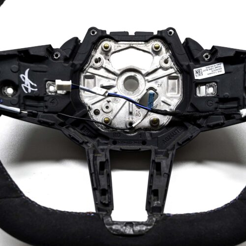Close up shot of the OEM BMW M Flat bottom alcantara steering wheel - 32307908502