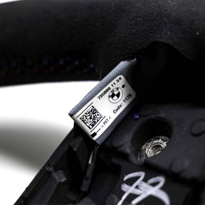 Close up of the label of the OEM BMW M Flat bottom alcantara steering wheel - 32307908502