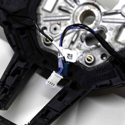 Close up shot of the OEM BMW M4 Flat bottom leather steering wheel, 32305A8A906