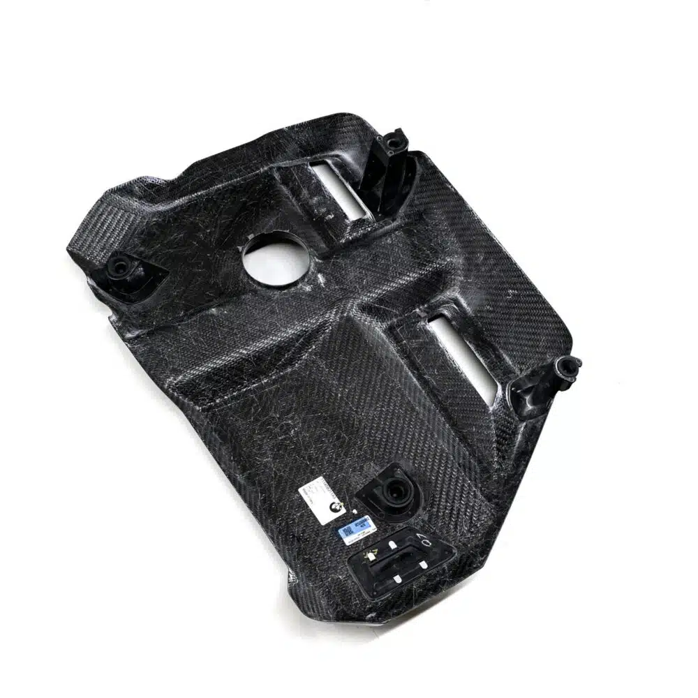 OEM BMW Carbon fiber engine cover for the G87 M2, G80, G81, G82, G83 BMWs photographed from the bottom