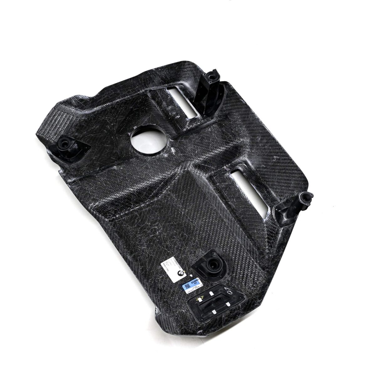 OEM BMW Carbon fiber engine cover for the G87 M2, G80, G81, G82, G83 BMWs photographed from the bottom