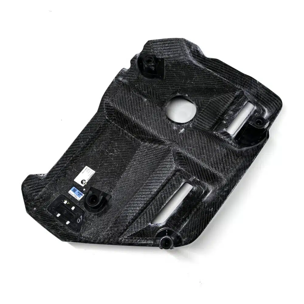 Rear view shot of the OEM BMW Carbon fiber engine cover for S58 engines 11145B311A3 showing the inner structure