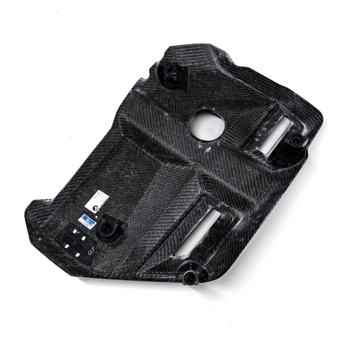 Rear view shot of the OEM BMW Carbon fiber engine cover for S58 engines 11145B311A3 showing the inner structure