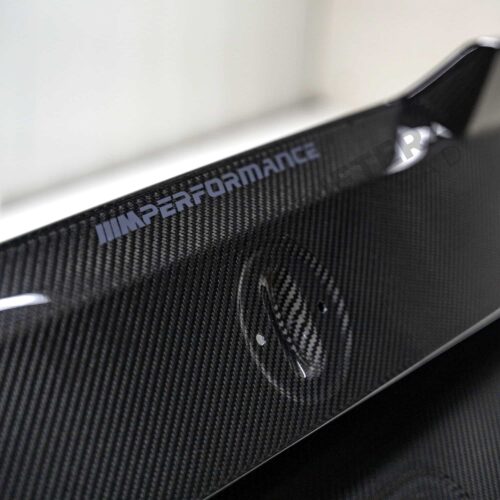 close up shot of the emblem of OEM BMW M Performance Carbon fiber trunk lid - 41622460278