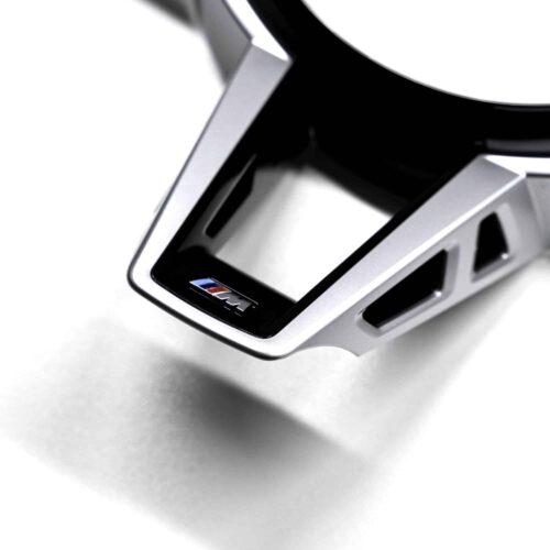 Close up shot of the M logo on the OEM BMW M Sport steering wheel trim M4 LCI - 32307908503