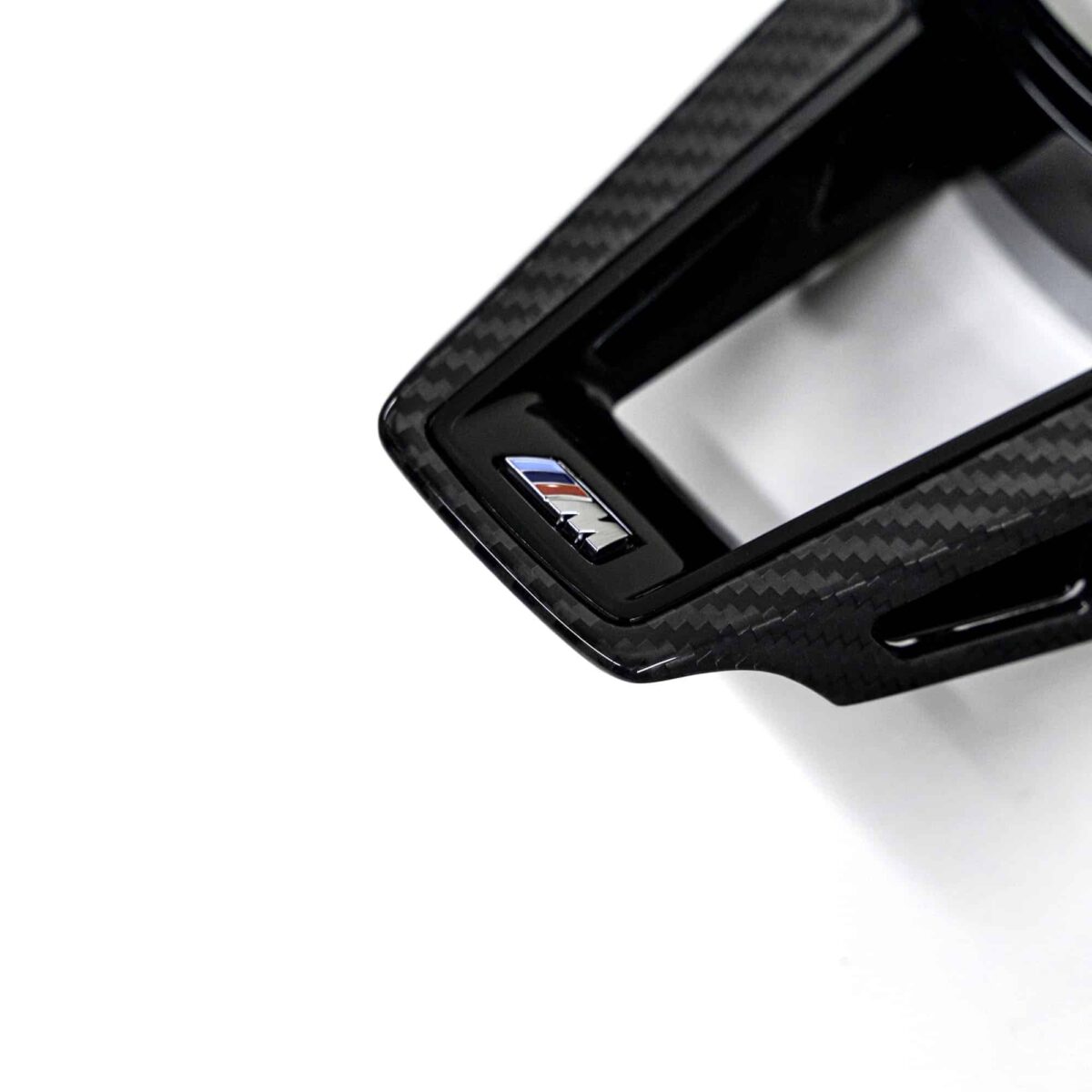 Close up view of the M logo on the OEM BMW M Sport steering wheel trim without driving assistant professional M4 LCI - 32307908505