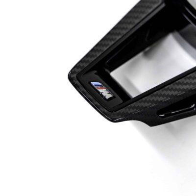 Close up view of the M logo on the OEM BMW M Sport steering wheel trim without driving assistant professional M4 LCI - 32307908505