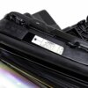 Close up of an OEM BMW F90 M5 CS laser headlight, for right hand drive vehicles, left side with label