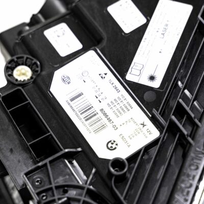 Close up shot of the BMW F90 M5 CS Left Laser headlight from the top showing the labels