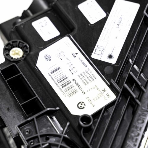 Close up shot of the BMW F90 M5 CS Left Laser headlight from the top showing the labels