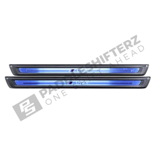 top down shot of the two OEM BMW G82 M4 CS Door sill trim - 51478086134