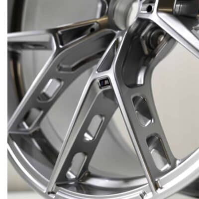 Close up shot of the OEM BMW M Performance 1063M Rear wheel in size 10,5Jx21ET20 part number 36108089392 showing the holes in the rim