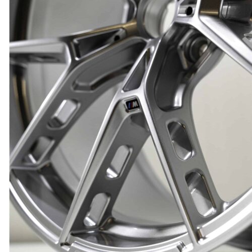 Close up shot of the OEM BMW M Performance 1063M Rear wheel in size 10,5Jx21ET20 part number 36108089392 showing the holes in the rim