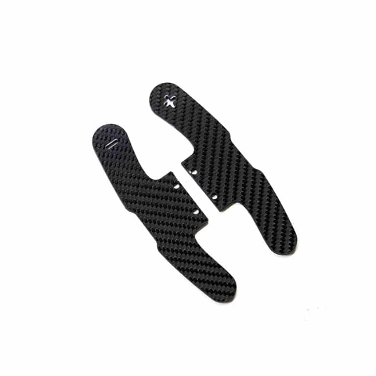Gloss carbon fiber paddle shifters plates for BMW F series models in Motorsport style photographer from a slight angle