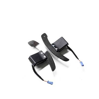 PaddleShifterz Magnetic Gloss carbon fiber paddle shifters for MINI photographed from the bottom on a white table