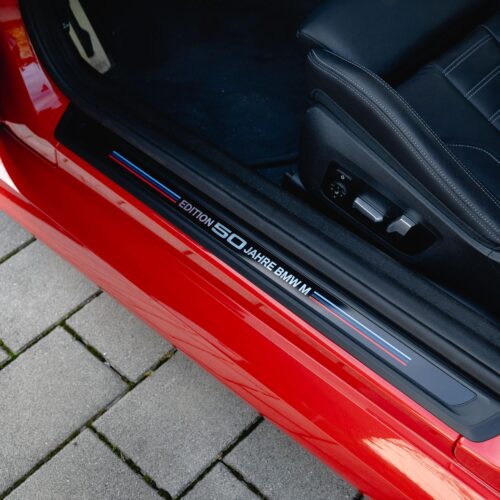 OEM BMW Edition 50 Year BMW M door sill trims - 51477858096 installed in a G87 M2