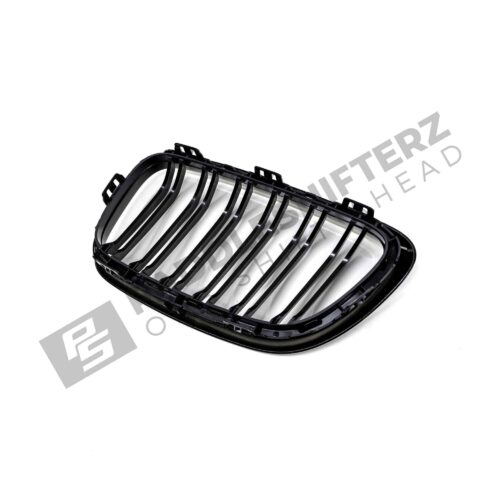 OEM BMW gloss black front grille for F87 M2 51712355447left side photographed from the back