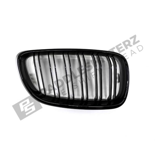 OEM BMW gloss black front grille for F87 M2 51712355447left side photographed from top down front side