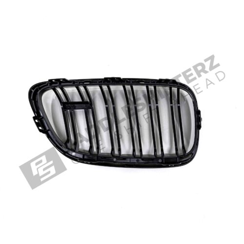 OEM BMW gloss black front grille for F87 M2 51712355448 right side photographed from the back